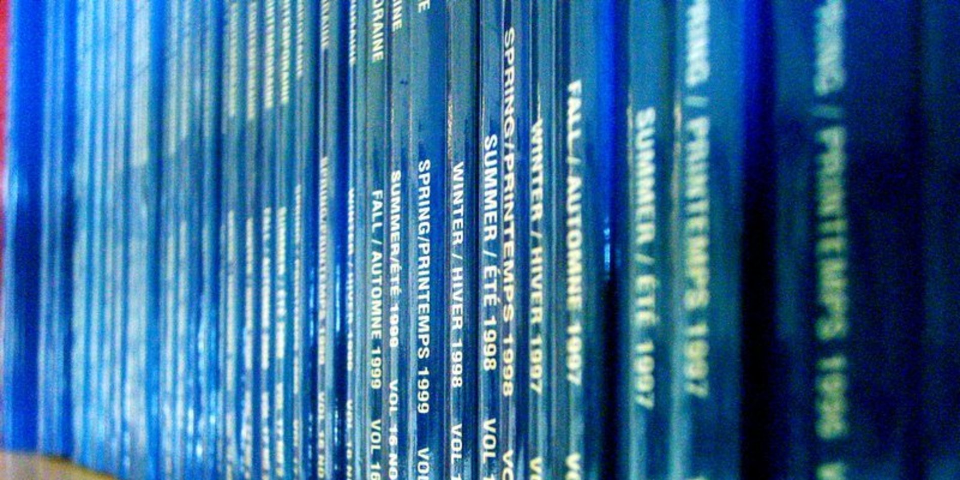 Fascicles of a scholarly journal with quarterly publication dates in English and French on the spines