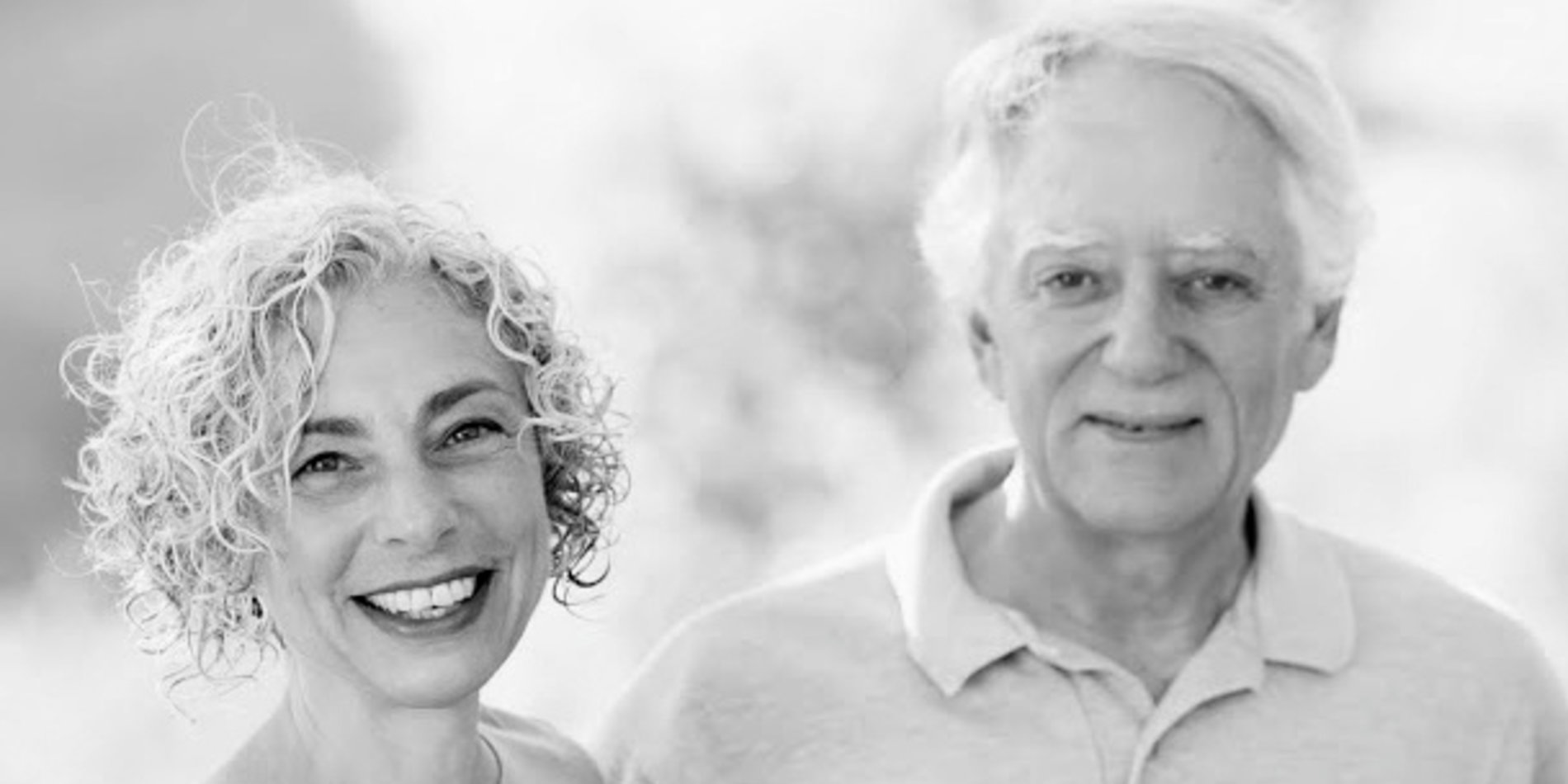 Black-and-white portrait photograph of Vicky Reich and David S. H. Rosenthal, both smiling