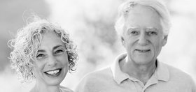 Black-and-white portrait photograph of Vicky Reich and David S. H. Rosenthal, both smiling